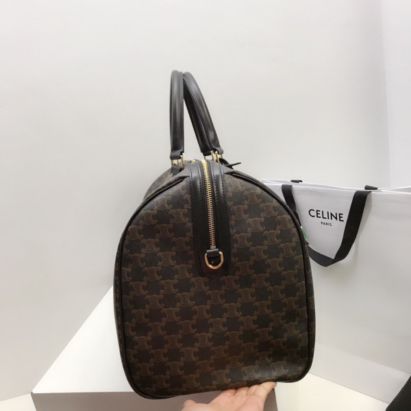 Ce**e large travel bag in triomphe canvas and calfskin