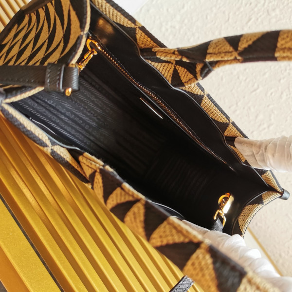 Pra*a small symbole jacquard fabric handbag