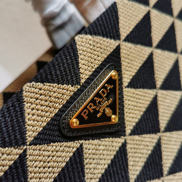 Pra*a small symbole jacquard fabric handbag