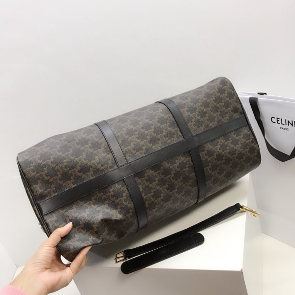 Ce**e large travel bag in triomphe canvas and calfskin
