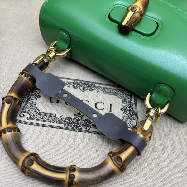 G*u*i small top handle bag with bamboo