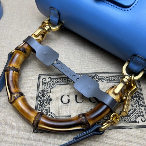 G*u*i small top handle bag with bamboo