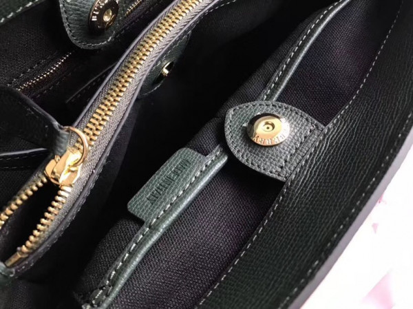 B**rry the medium banner in leather and house check