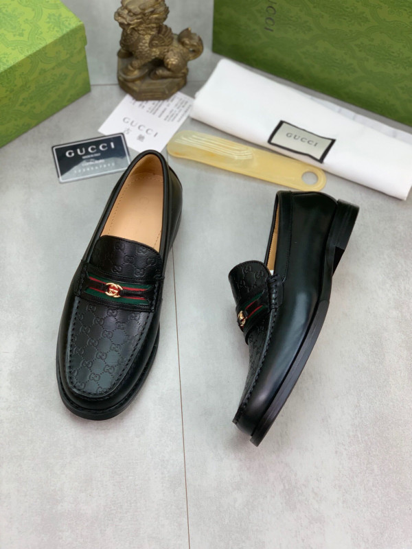 G*u*i loafers