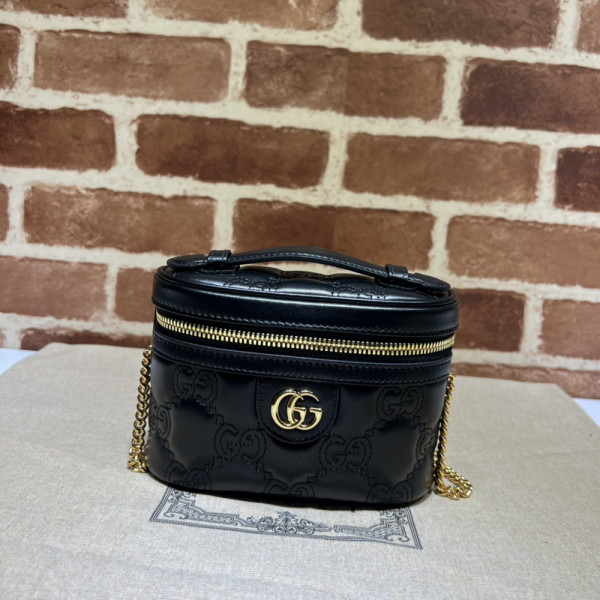 G*u*i gg matelassé top handle mini bag