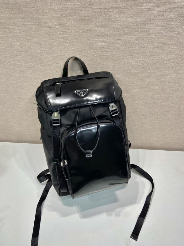 Pra*a re-nylon and brushed leather backpack