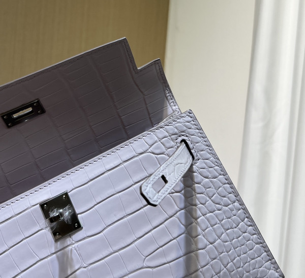 H**mes kelly pochette